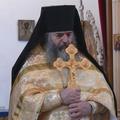 священник